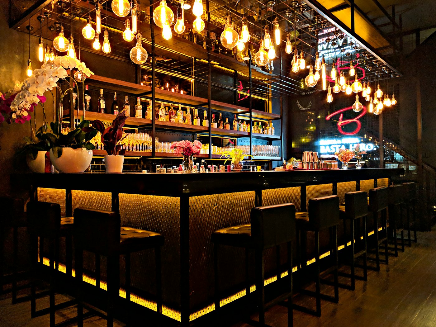 A warmly lit pub bar